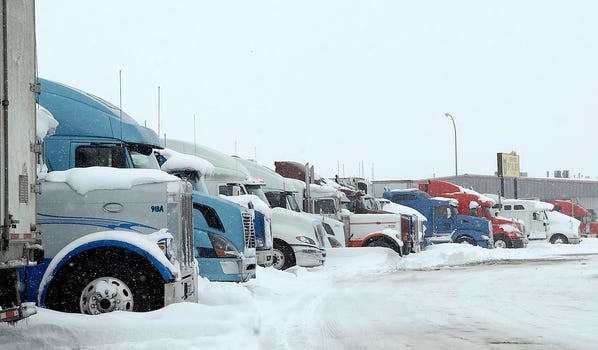 CMVs Parked In Snow